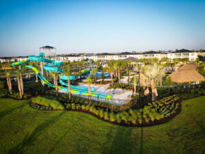 Champions Gate Retreat Clubhouse with lazy river, pools, slide and miniature golf