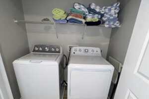 Champions Gate Rolling Skies Washer and Dryer Laundry room