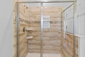 Champions Gate Rolling Skies Large Step In Shower in downstairs primary ensuite bathroom