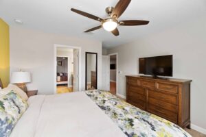 Champions Gate Rolling Skies upstairs King Bedroom retreat with smart tv and access to full jack and jill bathroom