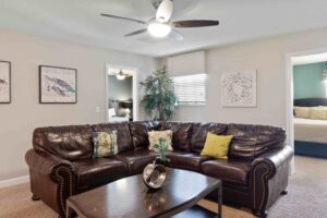 Champions Gate Rolling Skies upstairs loft to relax in large sectional and entertain in separate areas of the home