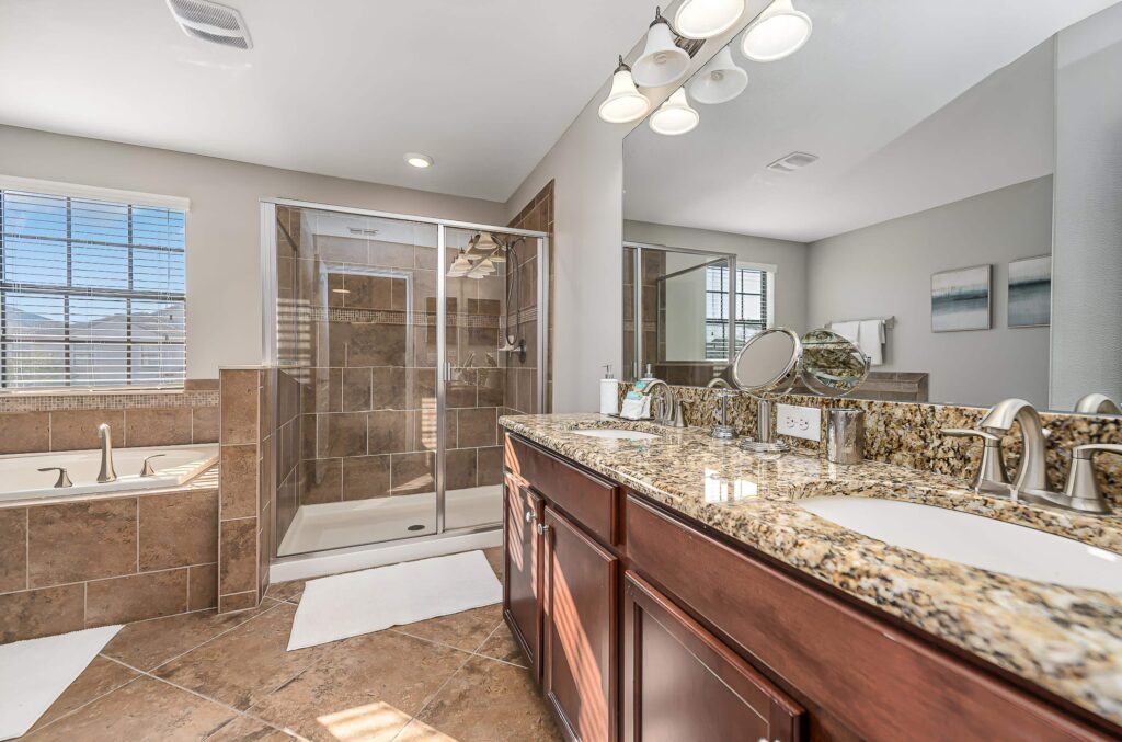 Champions Gate Epic Villa Upper Level Full Bathroom With Soaking Tub & Stand Up Shower