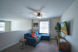 Champions Gate Magical Retreat upstairs loft with queen sleeper sofa, tv and xbox gaming