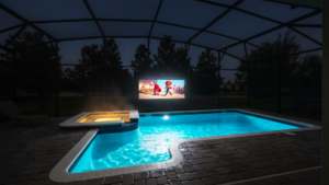 Illuminated swimming pool and outdoor movie screen at Rolling Skies at night